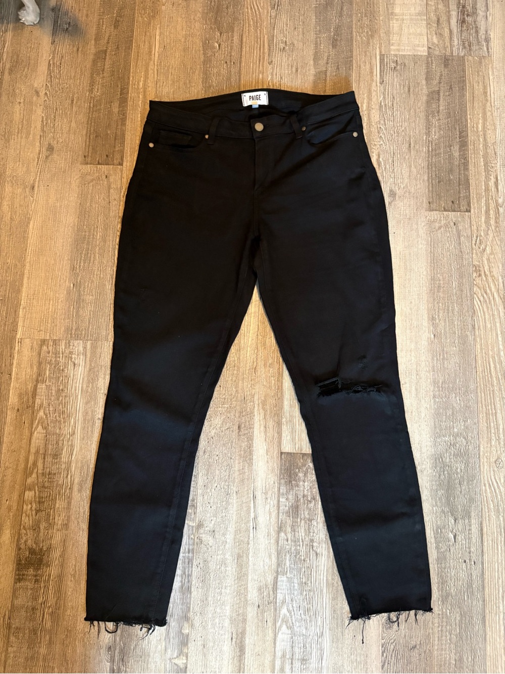 PAIGE Black Skinny Jeans with Knee Distress